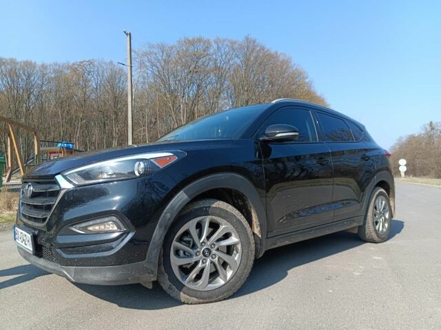 Чорний Хендай Туксон, об'ємом двигуна 1.6 л та пробігом 150 тис. км за 13500 $, фото 1 на Automoto.ua