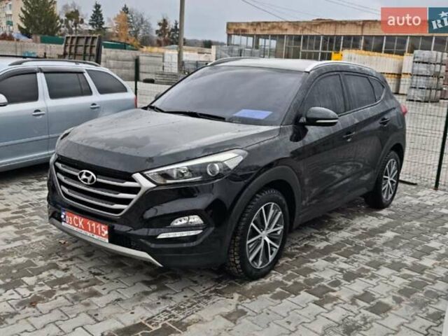 Черный Хендай Туксон, объемом двигателя 2 л и пробегом 178 тыс. км за 19200 $, фото 1 на Automoto.ua