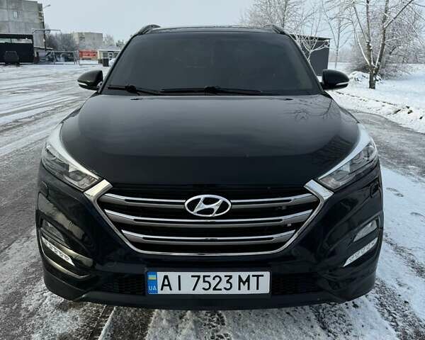 Черный Хендай Туксон, объемом двигателя 2 л и пробегом 103 тыс. км за 18500 $, фото 1 на Automoto.ua