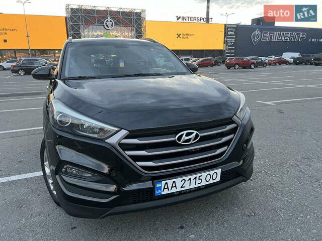 Черный Хендай Туксон, объемом двигателя 2 л и пробегом 159 тыс. км за 16500 $, фото 1 на Automoto.ua