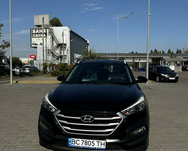 Черный Хендай Туксон, объемом двигателя 2 л и пробегом 110 тыс. км за 18000 $, фото 1 на Automoto.ua
