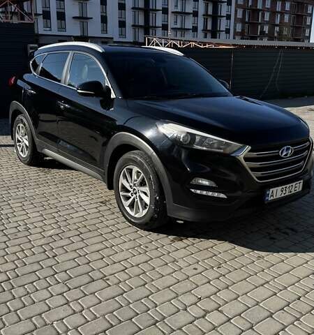 Черный Хендай Туксон, объемом двигателя 2 л и пробегом 222 тыс. км за 14000 $, фото 1 на Automoto.ua