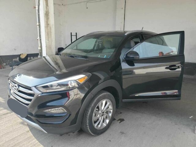 Чорний Хендай Туксон, об'ємом двигуна 2 л та пробігом 104 тис. км за 10100 $, фото 1 на Automoto.ua