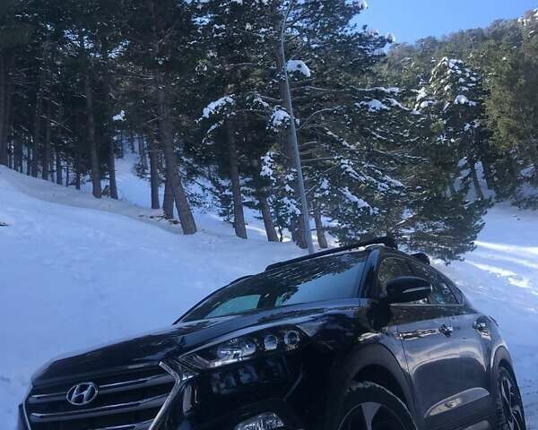 Черный Хендай Туксон, объемом двигателя 2 л и пробегом 71 тыс. км за 19999 $, фото 1 на Automoto.ua