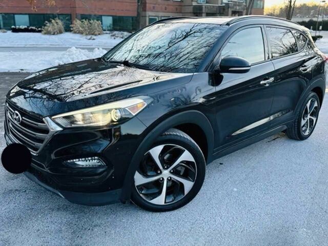 Черный Хендай Туксон, объемом двигателя 1.6 л и пробегом 71 тыс. км за 9000 $, фото 1 на Automoto.ua