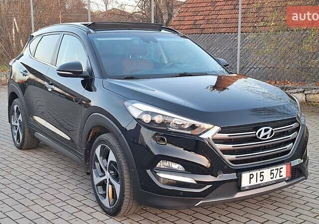 Черный Хендай Туксон, объемом двигателя 2 л и пробегом 192 тыс. км за 19999 $, фото 1 на Automoto.ua