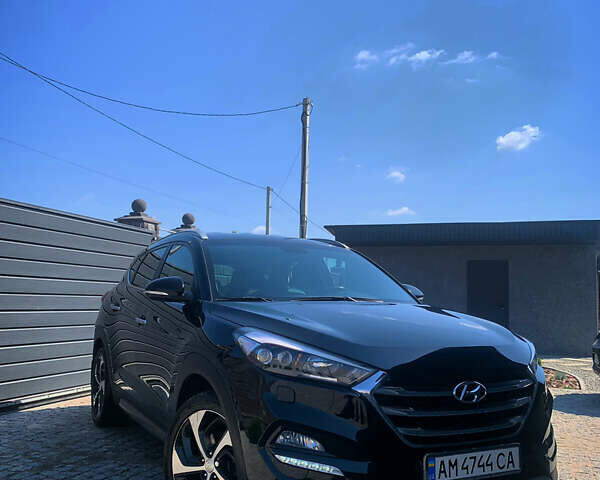 Черный Хендай Туксон, объемом двигателя 1.59 л и пробегом 92 тыс. км за 18800 $, фото 1 на Automoto.ua