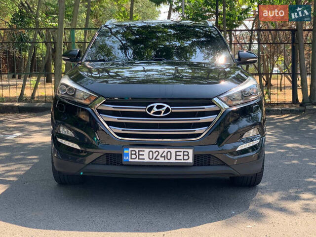 Черный Хендай Туксон, объемом двигателя 2 л и пробегом 122 тыс. км за 19800 $, фото 1 на Automoto.ua