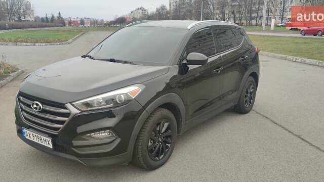 Чорний Хендай Туксон, об'ємом двигуна 2 л та пробігом 143 тис. км за 18000 $, фото 1 на Automoto.ua