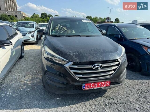 Чорний Хендай Туксон, об'ємом двигуна 2 л та пробігом 119 тис. км за 11700 $, фото 1 на Automoto.ua