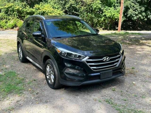 Черный Хендай Туксон, объемом двигателя 2 л и пробегом 83 тыс. км за 4400 $, фото 1 на Automoto.ua