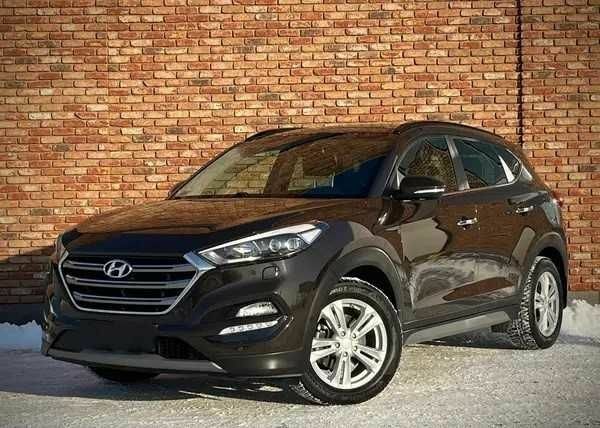 Чорний Хендай Туксон, об'ємом двигуна 2 л та пробігом 131 тис. км за 10400 $, фото 1 на Automoto.ua
