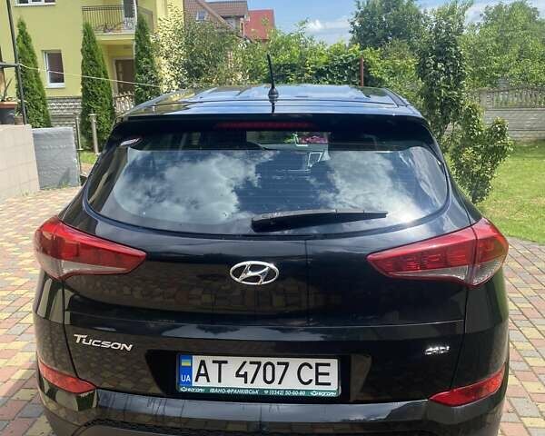 Черный Хендай Туксон, объемом двигателя 1.59 л и пробегом 117 тыс. км за 18200 $, фото 1 на Automoto.ua