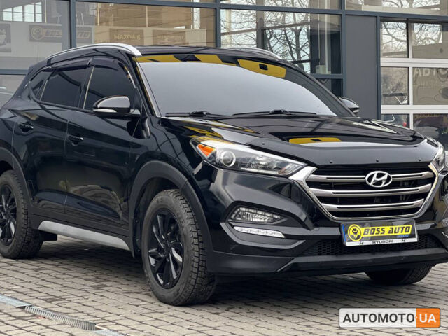 Черный Хендай Туксон, объемом двигателя 2 л и пробегом 106 тыс. км за 17900 $, фото 1 на Automoto.ua