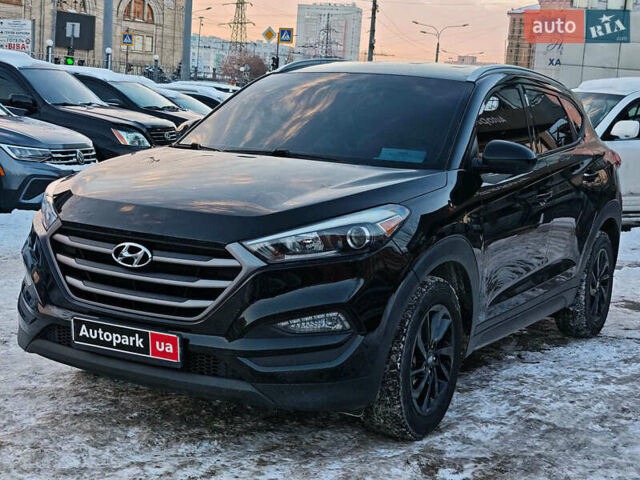 Черный Хендай Туксон, объемом двигателя 2 л и пробегом 143 тыс. км за 14690 $, фото 1 на Automoto.ua