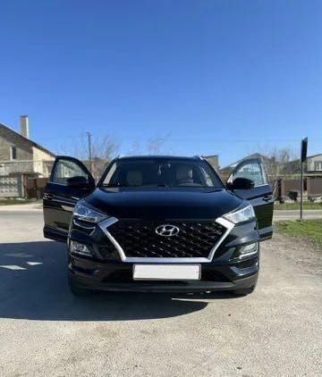 Черный Хендай Туксон, объемом двигателя 2 л и пробегом 108 тыс. км за 10000 $, фото 1 на Automoto.ua