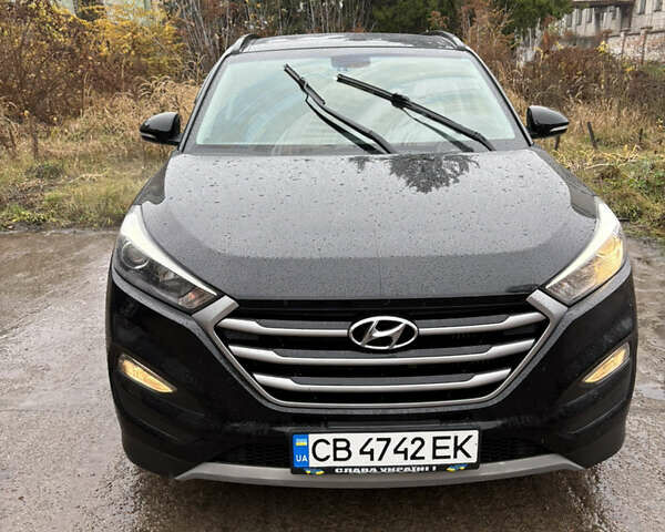 Черный Хендай Туксон, объемом двигателя 1.59 л и пробегом 49 тыс. км за 17500 $, фото 1 на Automoto.ua