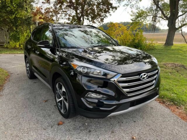 Черный Хендай Туксон, объемом двигателя 1.6 л и пробегом 34 тыс. км за 19000 $, фото 1 на Automoto.ua
