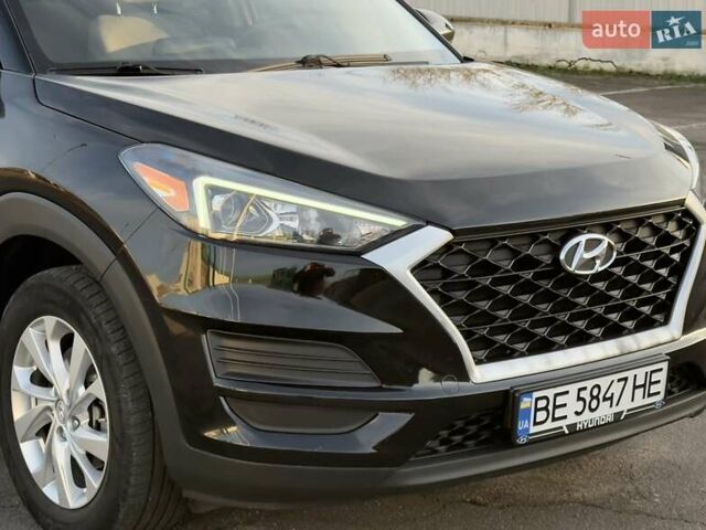 Черный Хендай Туксон, объемом двигателя 2 л и пробегом 127 тыс. км за 18900 $, фото 1 на Automoto.ua