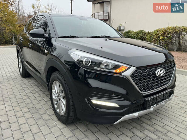 Черный Хендай Туксон, объемом двигателя 1.69 л и пробегом 134 тыс. км за 21800 $, фото 1 на Automoto.ua