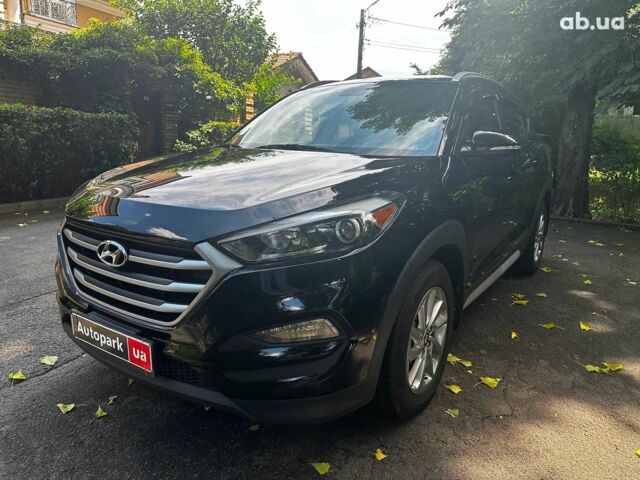 Черный Хендай Туксон, объемом двигателя 2 л и пробегом 109 тыс. км за 18490 $, фото 1 на Automoto.ua