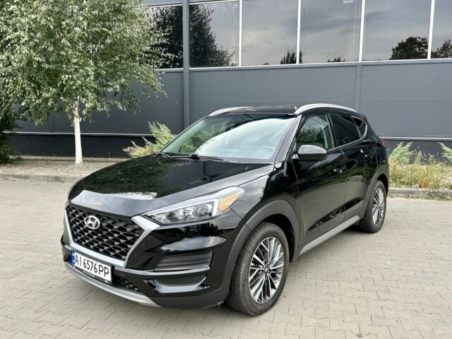 Черный Хендай Туксон, объемом двигателя 2.4 л и пробегом 147 тыс. км за 16400 $, фото 1 на Automoto.ua