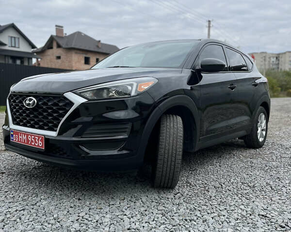 Черный Хендай Туксон, объемом двигателя 2 л и пробегом 192 тыс. км за 15200 $, фото 1 на Automoto.ua