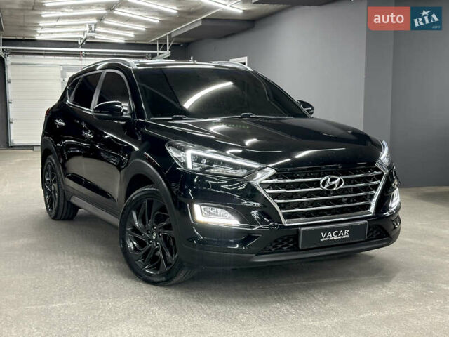 Черный Хендай Туксон, объемом двигателя 2 л и пробегом 153 тыс. км за 20500 $, фото 1 на Automoto.ua