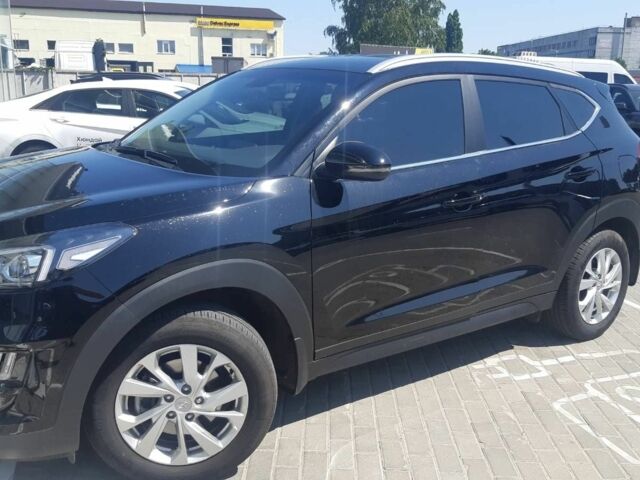 Черный Хендай Туксон, объемом двигателя 2 л и пробегом 42 тыс. км за 25000 $, фото 1 на Automoto.ua