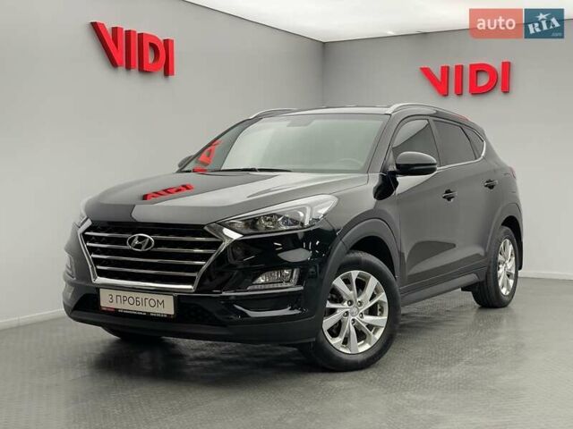 Черный Хендай Туксон, объемом двигателя 2 л и пробегом 100 тыс. км за 22424 $, фото 1 на Automoto.ua