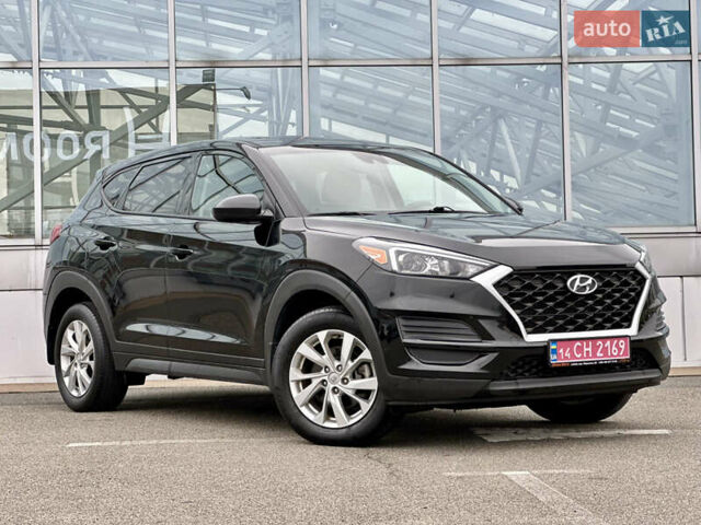 Черный Хендай Туксон, объемом двигателя 2 л и пробегом 48 тыс. км за 20490 $, фото 1 на Automoto.ua