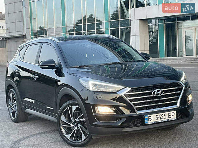 Черный Хендай Туксон, объемом двигателя 2 л и пробегом 67 тыс. км за 23700 $, фото 1 на Automoto.ua