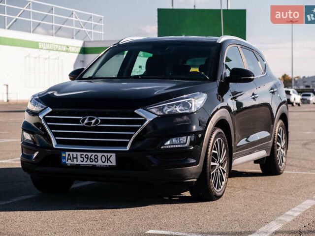 Черный Хендай Туксон, объемом двигателя 2 л и пробегом 88 тыс. км за 23000 $, фото 1 на Automoto.ua