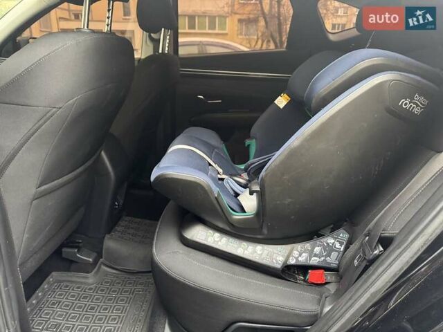 Черный Хендай Туксон, объемом двигателя 2 л и пробегом 131 тыс. км за 23500 $, фото 1 на Automoto.ua