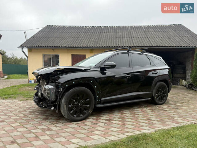Черный Хендай Туксон, объемом двигателя 2.5 л и пробегом 81 тыс. км за 14900 $, фото 1 на Automoto.ua