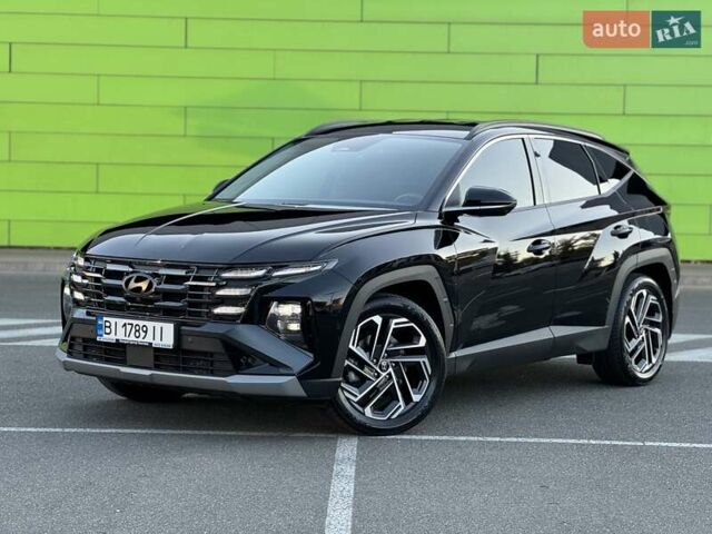 Черный Хендай Туксон, объемом двигателя 2 л и пробегом 55 тыс. км за 33900 $, фото 1 на Automoto.ua