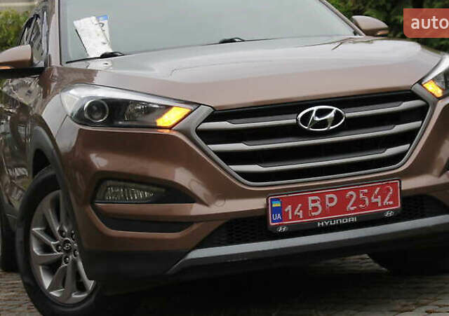 Коричневый Хендай Туксон, объемом двигателя 1.59 л и пробегом 127 тыс. км за 14400 $, фото 1 на Automoto.ua