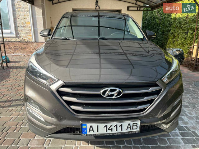 Коричневий Хендай Туксон, об'ємом двигуна 2 л та пробігом 75 тис. км за 19000 $, фото 1 на Automoto.ua