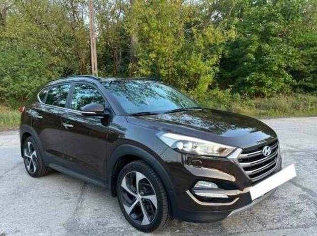 Коричневый Хендай Туксон, объемом двигателя 2 л и пробегом 140 тыс. км за 12100 $, фото 1 на Automoto.ua