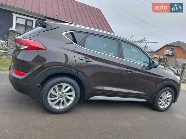 Коричневий Хендай Туксон, об'ємом двигуна 2 л та пробігом 87 тис. км за 19300 $, фото 1 на Automoto.ua