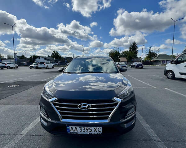 Коричневый Хендай Туксон, объемом двигателя 2 л и пробегом 99 тыс. км за 21000 $, фото 1 на Automoto.ua