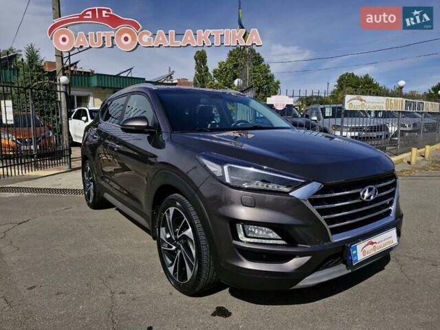 Коричневый Хендай Туксон, объемом двигателя 2 л и пробегом 127 тыс. км за 24999 $, фото 1 на Automoto.ua