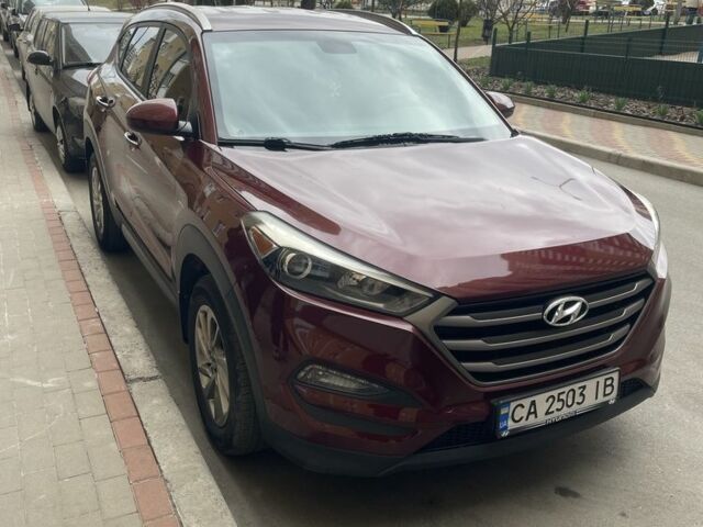 Червоний Хендай Туксон, об'ємом двигуна 2 л та пробігом 115 тис. км за 12700 $, фото 1 на Automoto.ua