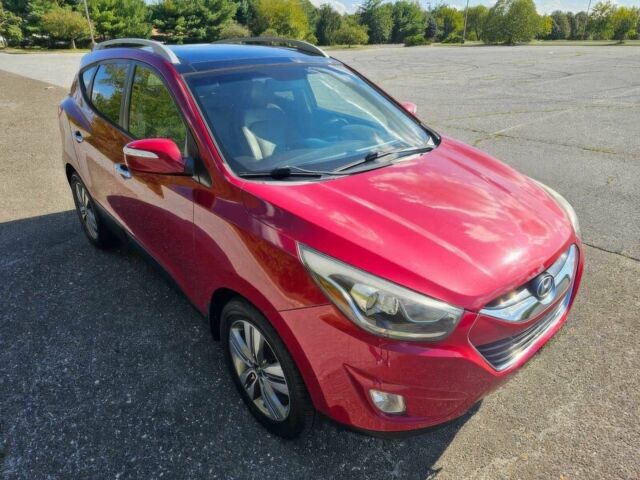 Червоний Хендай Туксон, об'ємом двигуна 2.4 л та пробігом 85 тис. км за 13100 $, фото 1 на Automoto.ua