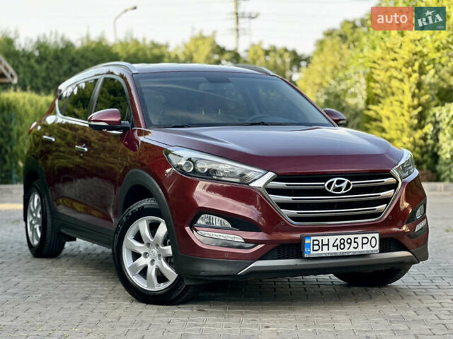 Червоний Хендай Туксон, об'ємом двигуна 2 л та пробігом 170 тис. км за 17999 $, фото 1 на Automoto.ua