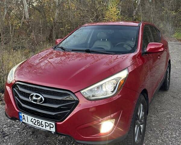 Хендай Туксон 2015 в Белой Церкве на Automoto.ua Красный Хендай Туксон, объемом двигателя 2 л и пробегом 174 тыс. км за 13500 $, фото 1 на Automoto.ua
