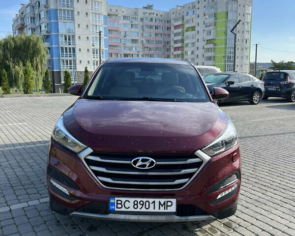 Красный Хендай Туксон, объемом двигателя 2 л и пробегом 133 тыс. км за 14500 $, фото 1 на Automoto.ua