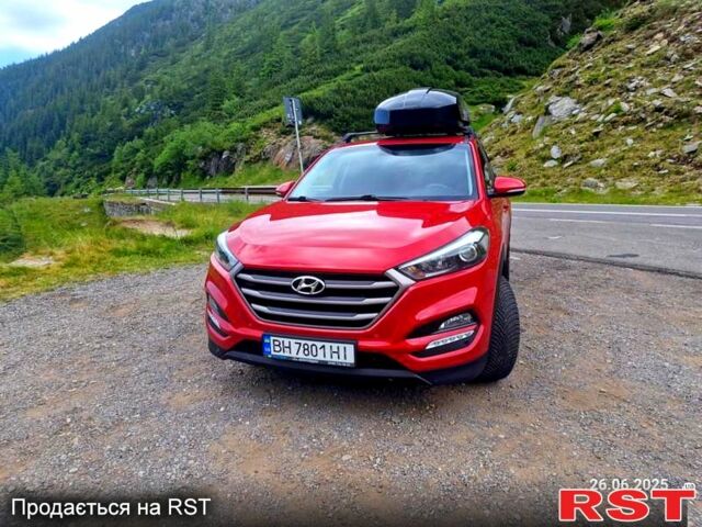 Красный Хендай Туксон, объемом двигателя 2 л и пробегом 110 тыс. км за 19000 $, фото 1 на Automoto.ua