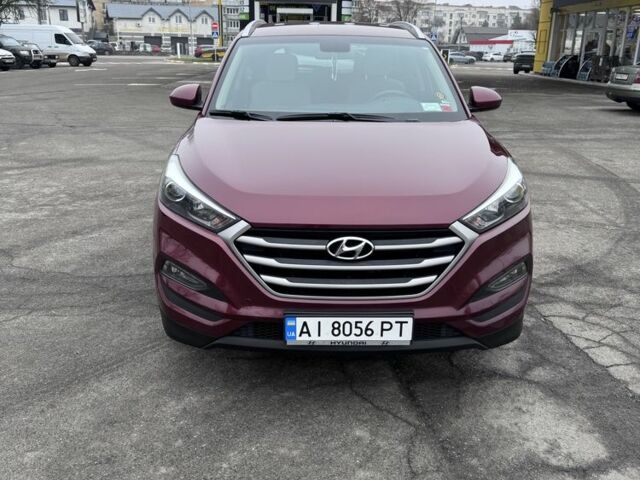 Червоний Хендай Туксон, об'ємом двигуна 2 л та пробігом 101 тис. км за 14800 $, фото 1 на Automoto.ua