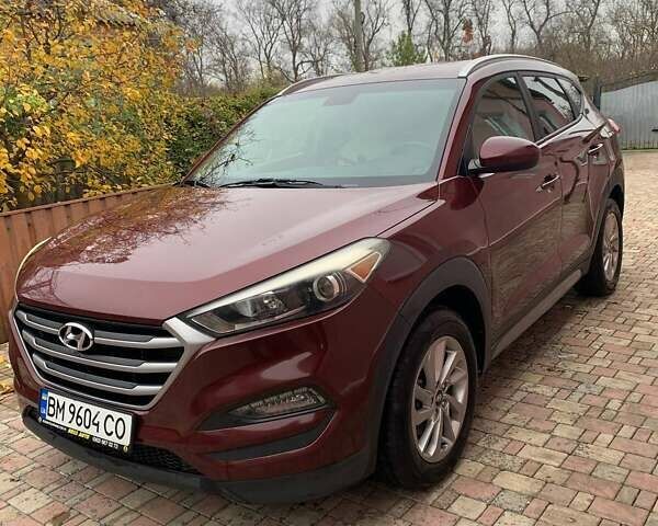 Красный Хендай Туксон, объемом двигателя 2 л и пробегом 123 тыс. км за 15300 $, фото 1 на Automoto.ua